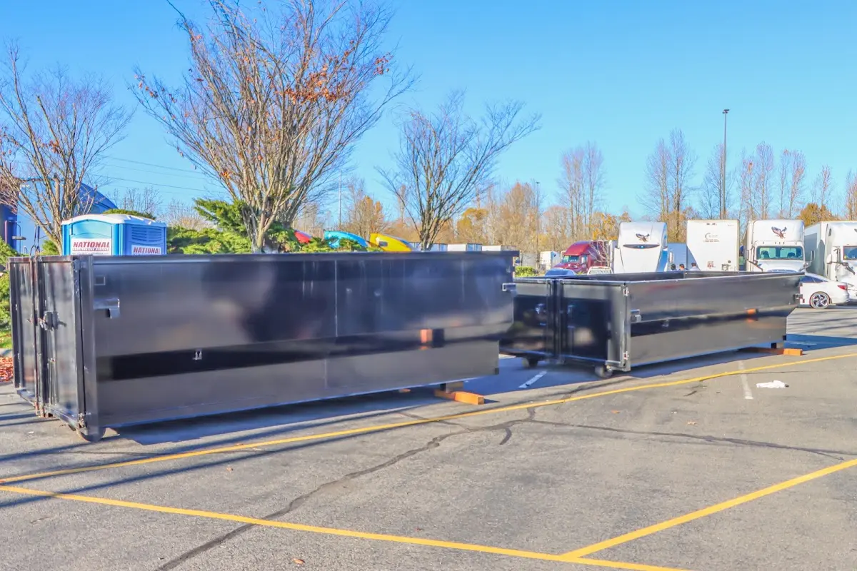 Professional dumpster rental service with roll-off container on residential driveway in Sierra Vista Southeast